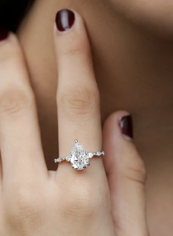 pear ring with spaced stones