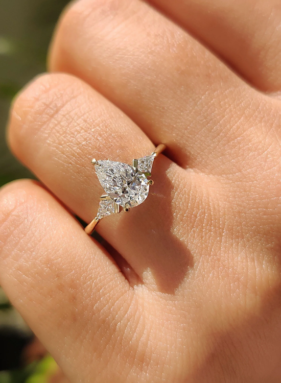 delicate pear cut ring