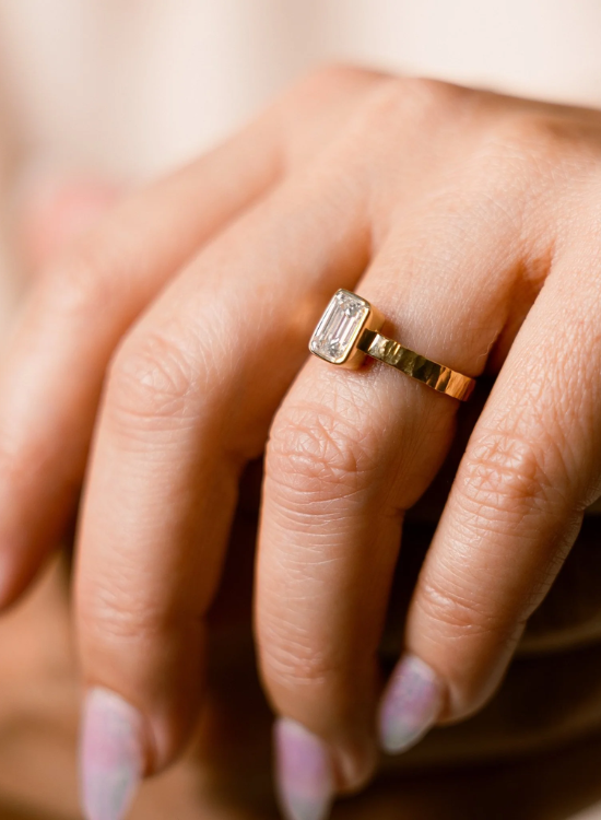 emerald with wide gold ring